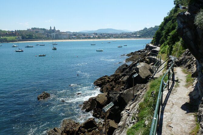 Boat by the Bay and Santa Clara Island in Donostia San Sebastian - Hondalea and the House of the Lighthouse by Cristina Iglesias