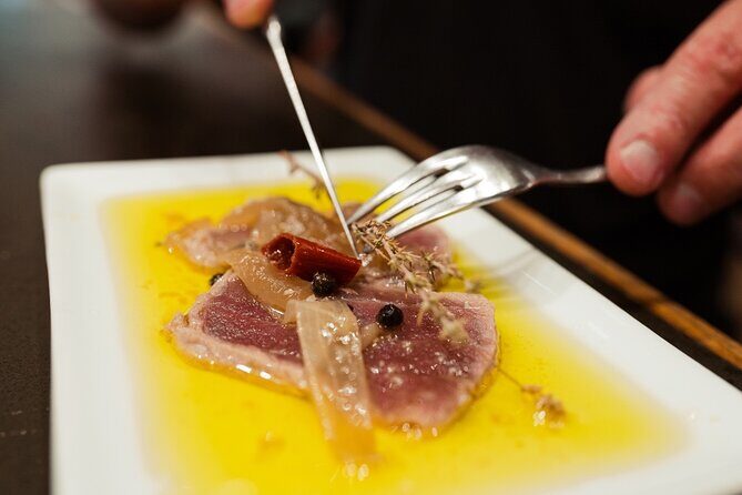 Private San Sebastian Pintxos Tour with Local Guide - Stop 3: Sarriegi Plaza for txakoli, cider, and zurito