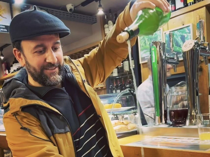 San Sebastian: Market, Pintxos and Wine Tasting Tour - Market stop: ham, cheese, olives, and where Basque flavors start