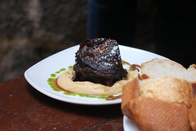 San Sebastián Walking Dinner Tour with Basque Bites - Five pintxo bars and the smart drink mix