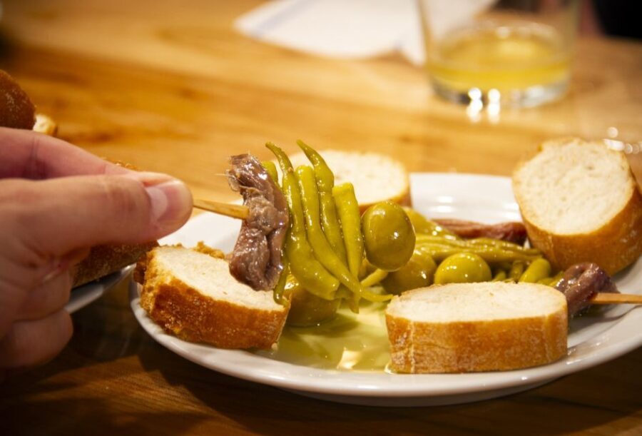 Secret walking Food Tours San Sebastian - Stop 1: A family-owned 1942 pintxos bar and Basque cider basics